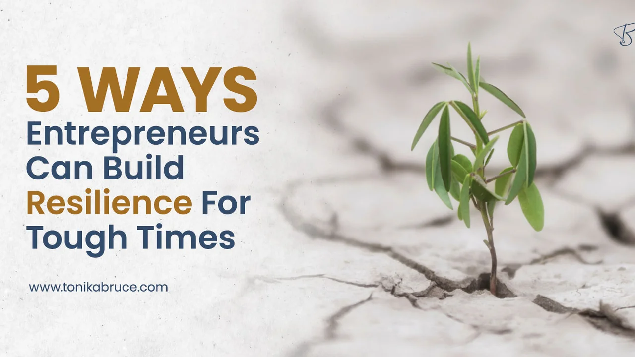 Two mint chocolate milkshakes with whipped cream and green sprinkles.