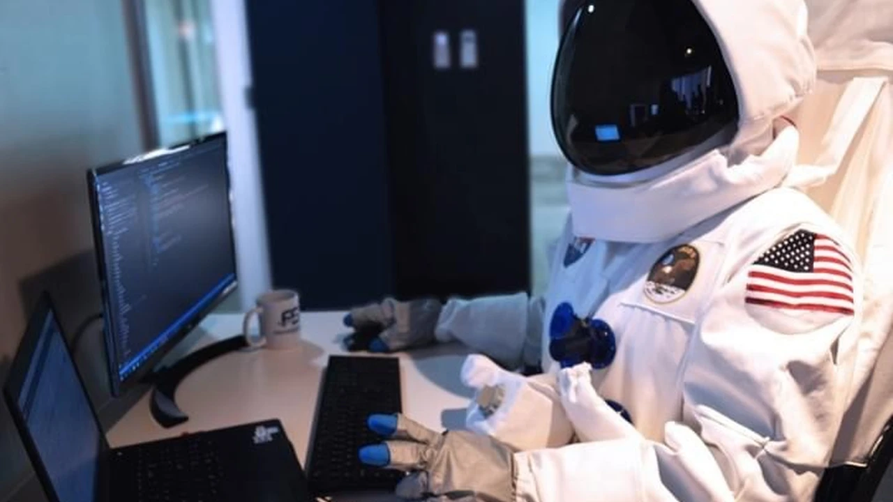 Close up on a plate of mashed potatoes, topped with baked pork chops with cream of mushroom soup, and a side of green beans.